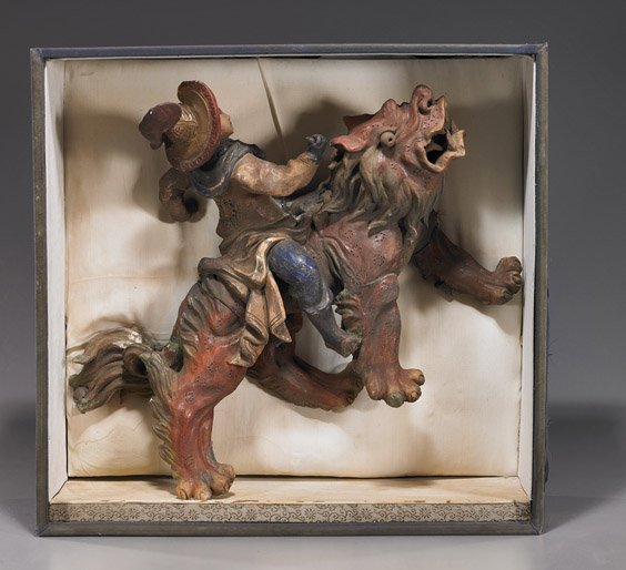 Chinese Pottery Roof Tile: Qilin & Rider: Chinese Pottery Roof Tile: Qilin & Rider Old Chinese parcel-glazed pottery roof tile; in the form of a figure wearing a hat and riding on a qilin in a very active pose (some wear and old flaws); L: 15