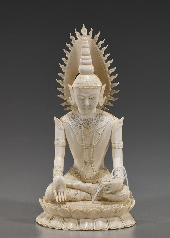 Chinese Carved Ivory Buddhist Figure: Chinese Carved Ivory Buddhist Figure Well carved, Chinese Qianlong-style ivory Buddhist figure; in Southeast Asian design and seated on a lotus base, with hands in mudra, tall pointed ushnisha and fla