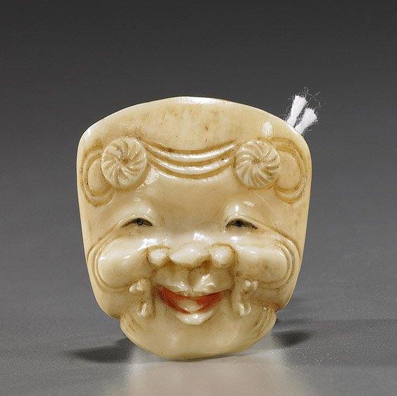 Antique Carved Bone Netsuke: Mask: Antique Carved Bone Netsuke: Mask Antique carved bone netsuke; of an Okina mask, some light polychrome remaining, signed Gyokusai (some wear), Circa 1900