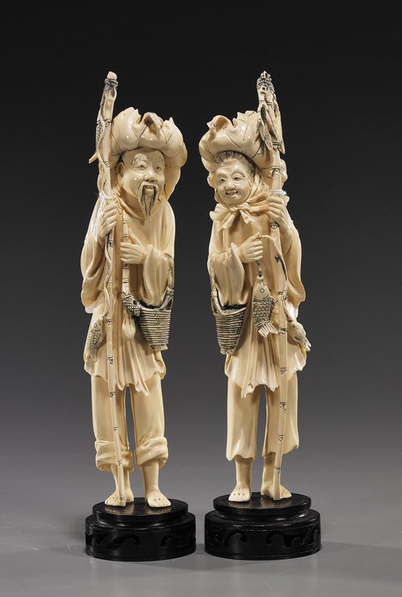 Pair Chinese Carved Ivory Fishing Couple: Pair Chinese Carved Ivory Fishing Couple Pair Chinese carved and lightly stained ivory figures; of a fisherman and woman: each wearing a leaf hat and carrying a basket on one arm, a bamboo pole in the