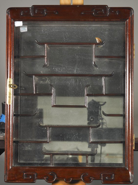 Chinese Rosewood Wall Display Cabinet: Chinese Rosewood Wall Display Cabinet Chinese rosewood snuff bottle/netsuke display cabinet; with many staggered shelves before a mirrored back and with glazed door front (unlocked and without key); H