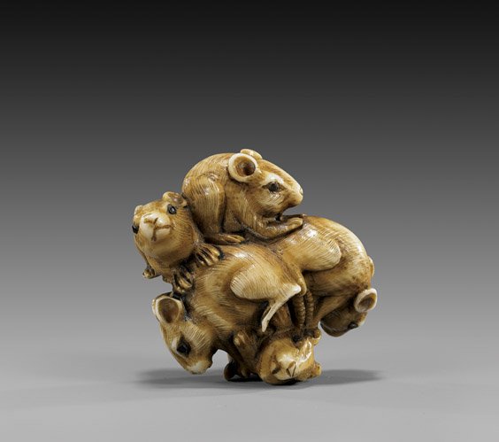 CARVED IVORY NETSUKE: Five Rodents: 象牙根付 CARVED IVORY NETSUKE: Five Rodents Charming carved ivory netsuke: of a group of five rodents, all in a cluster, with inlaid eyes, attractively parcel-stained; signed Y