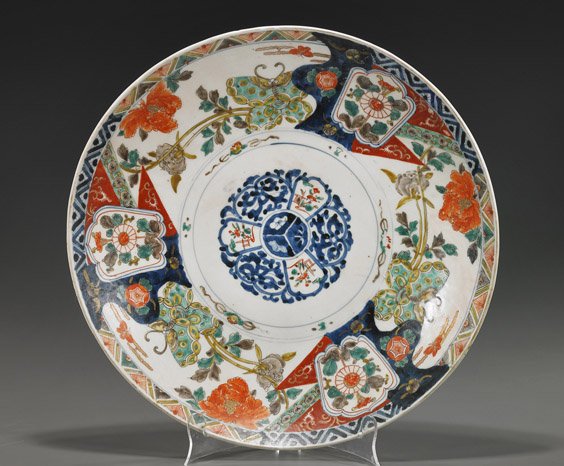Antique Japanese Imari Porcelain Charger: Antique Japanese Imari Porcelain Charger Large, antique Japanese Imari porcelain charger; circular with elaborate polychrome butterfly and floral panels (rim repair), 19th Century; D: 16 1/2"