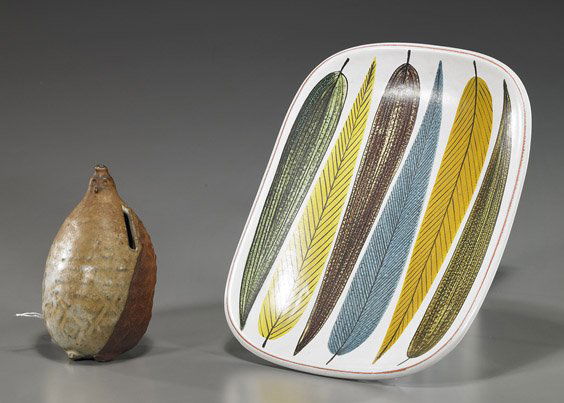 Two Scandinavian Earthenware Items: Two Scandinavian Earthenware ItemsTwo various Scandinavian earthenware items: parcel glazed coin bank, somewhat figural form with moulded head, incised mark to base, Circa 1970; and a Swedish rectangu