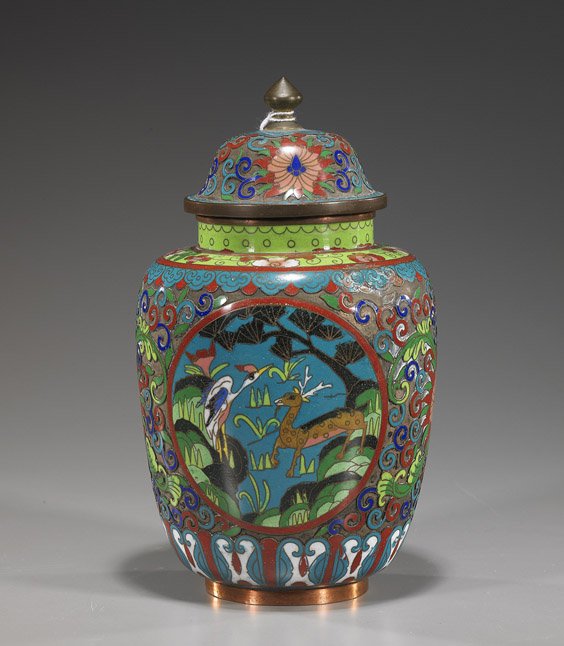 Chinese Cloisonné Enamel Jar & Cover: Chinese Cloisonné Enamel Jar & Cover Early 20th Century, Chinese openwork cloisonné enamel jar and cover; of ovoid form and with deer and crane panels on ground of Buddhist floral designs (dent); H: