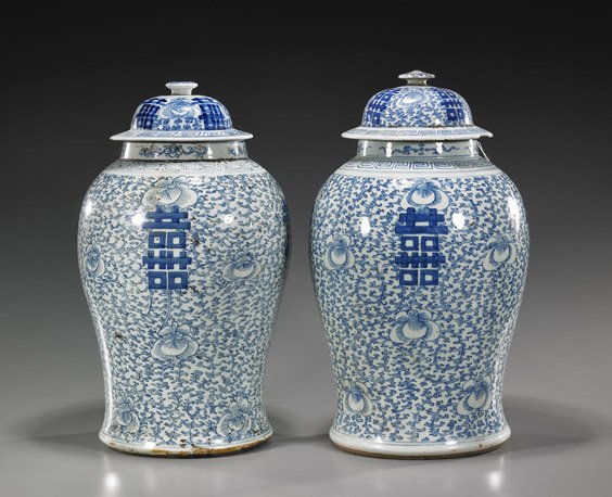 Pair Chinese Blue & White Porcelain Jars: Pair Chinese Blue & White Porcelain Jars Pair Chinese blue and white porcelain jars and covers: the bodies of baluster form with double happiness symbols among Buddhist scrolling florals (somewhat mis