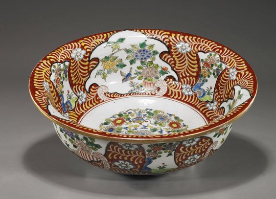 Antique Japanese Imari Porcelain Bowl: Antique Japanese Imari Porcelain Bowl Antique Japanese Imari porcelain bowl; circular with everted rim, floral medallion to the center and with bird and floral panels interior and exterior, Circa 1900