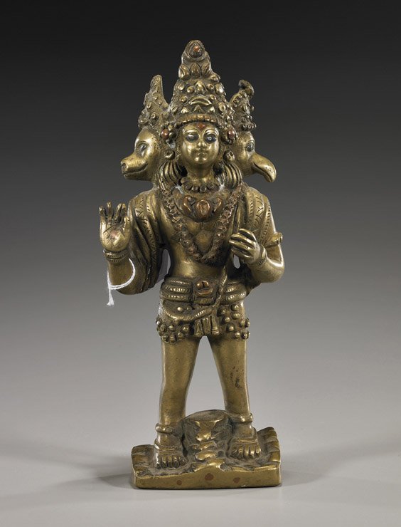 Indian Bronze Multi-Headed Deity: Indian Bronze Multi-Headed Deity Elaborately cast, Early-style Indian bronze multi-headed deity; standing with hands in mudra, one head in the form of a bird; another as a dog, coppery highlights (som