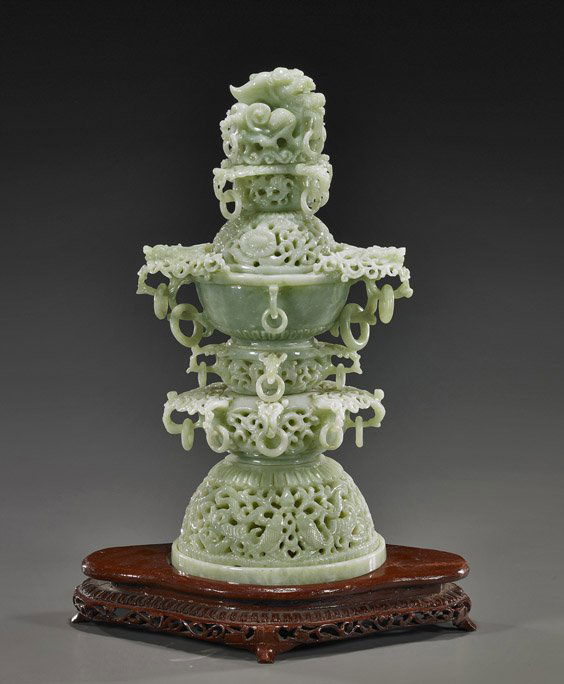 Tall Chinese Carved Bowenite Censer: Tall Chinese Carved Bowenite CenserTall Chinese, elaborately openwork carved, sectional bowenite censer and cover: pedestal footed, with dragon head handles writhing dragon finial; pending a total of
