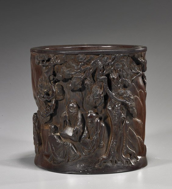 Chinese Carved Bamboo Brushpot: Chinese Carved Bamboo Brushpot Chinese carved bamboo brushpot; with detailed continuous scene of scholars and attendants amid pine and caved in relief and openwork; H: 6 1/4"