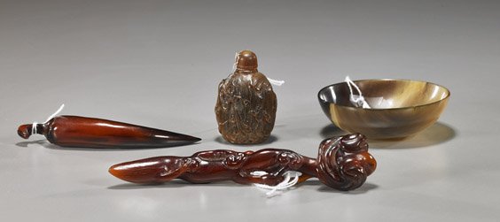 Group of 4 Small Chinese Horn Items: Group of 4 Small Chinese Horn Items Group of 4 small horn items, including: miniature ruyi scepter; chili form; translucent bowl with 4-character mark; and snuff bottle with dragons in relief; L: 5 1/