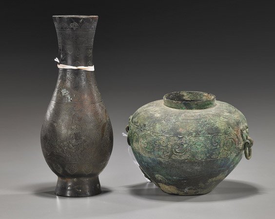 Two Early Chinese Bronze Vessels: Two Early Chinese Bronze Vessels Two Early Chinese bronze Vessels: well patinated tapered globular form with 2 loose ring handles and bands of decorative scrolling motifs, probably Zhou or Warring Sta