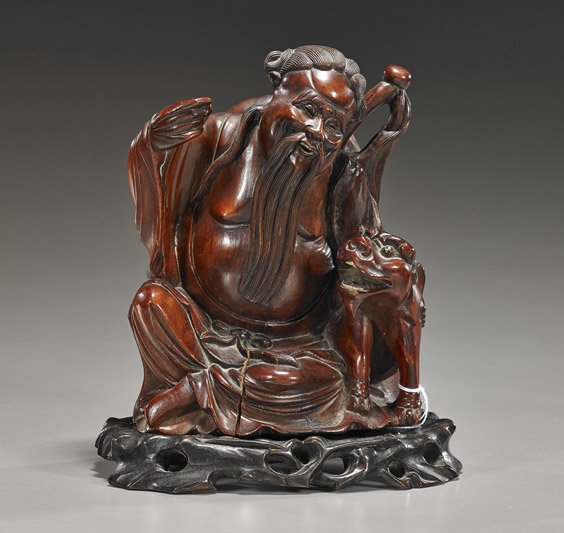Old Chinese Carved Rosewood Figure: Old Chinese Carved Rosewood Figure Early 20th Century Chinese carved rosewood figure of an Immortal/Lohan; seated with a wide-brimmed hat and sword at his back and a tiger by his side (crack and piece