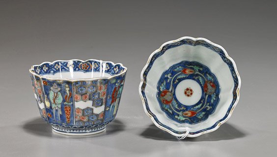 Pair Antique Imari Porcelain Bowls: Pair Antique Imari Porcelain Bowls Pair antique Japanese Imari porcelain bowls; Namban-type of foliate form: with panels featuring foreigners and patterned motifs; florals to the interior, 4-character