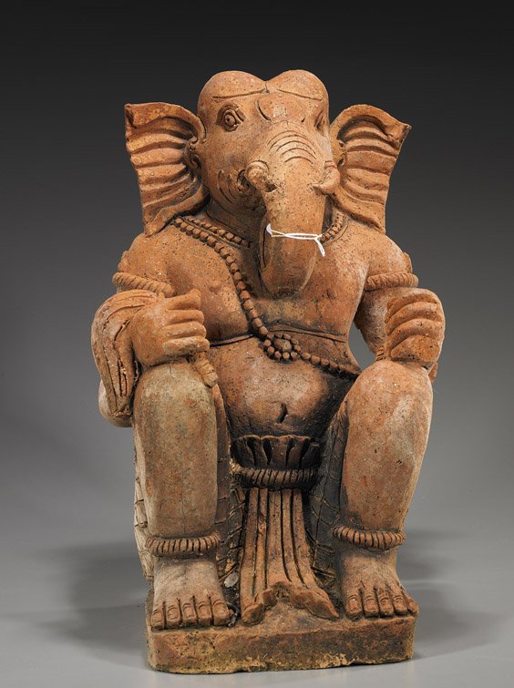 Large Southeast Asian/Indian Stucco Ganesha: Large Southeast Asian/Indian Stucco Ganesha Large Southeast Asian or Indian sub-continent, stained stucco figure of Ganesha; seated with hands resting on knees, holding a whisk in one hand (section of