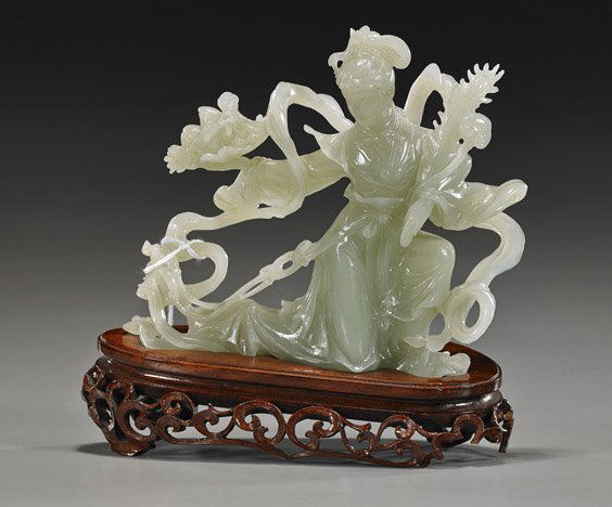 Chinese Carved Celadon Jade Celestial Beauty: Chinese Carved Celadon Jade Celestial BeautyChinese carved highly translucent celadon jade celestial beauty: kneeling in long flowing robes and carrying a large feather in one hand; a tray of peaches