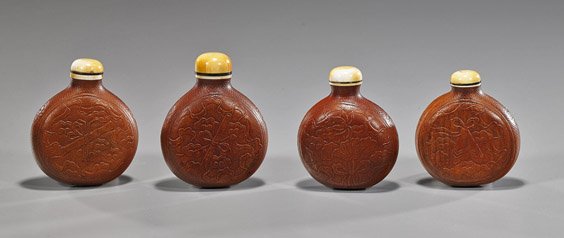 4 Chinese Moulded Gourd Snuff Bottles: 4 Chinese Moulded Gourd Snuff Bottles Box of 4, unusual Chinese moulded gourd snuff bottles: each with varying Buddhist emblems to each side; ivory tops and mounts, seal marks; H: 3 1/4" (tallest)