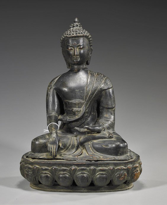 Probably Nepalese Seated Bronze Deity: Probably Nepalese Seated Bronze Deity Probably Nepalese, bronze deity; seated in lotus posture atop a stylized lotus base: with ushnisha, snail curl hair, and serene expression to the face, hands in m