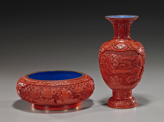 Two Chinese Cinnabar Lacquer Items: Two Chinese Cinnabar Lacquer ItemsTwo pieces Chinese carved cinnabar lacquer items: shallow circular bowl with inverted rim, floral motifs; together with a baluster form vase with landscape scenes and