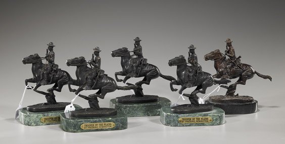 Group of 5 Bronzes After Remington: Group of 5 Bronzes After Remington Group of 5 bronze groups after Frederic Remington (American, 1861 - 1909): each of "Trooper of the Plains", depicting a man riding horseback, wearing a cowboy hat an