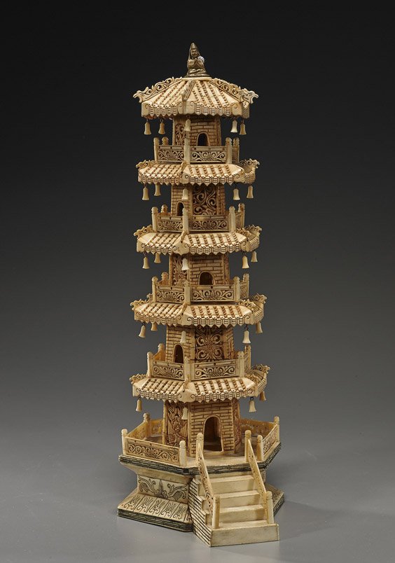 Tall Chinese Carved Bone Pagoda: Tall Chinese Carved Bone Pagoda Chinese carved bone pagoda; five levels, each openwork carved and with many hanging bell forms, with gilt bronze finial of a seated Buddhist figure; H: 18 1/2"