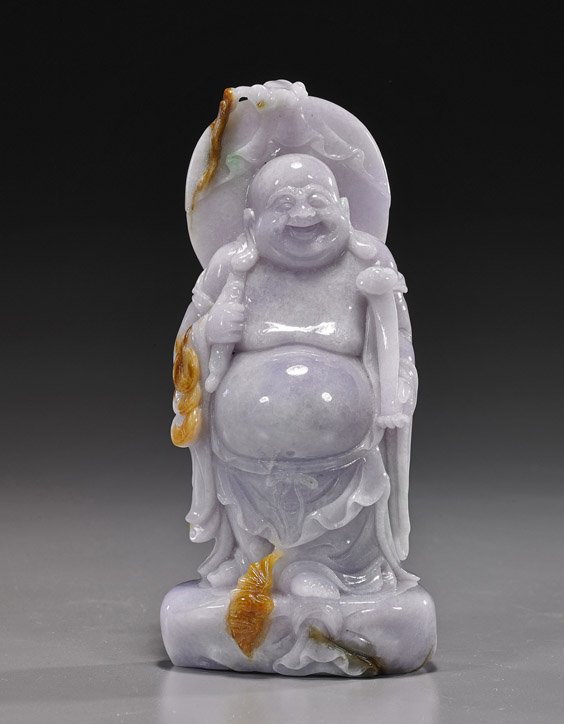 Chinese Carved Jadeite Standing Budai: Chinese Carved Jadeite Standing Budai Chinese carved jadeite Budai; standing on his sack and carrying a ruyi scepter in one hand, his hat on a stick over his shoulder, overall attractive lavender colo
