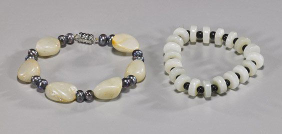 Two Celadon Jade Bead Bracelets: Two Celadon Jade Bead BraceletsTwo Baroque celadon jade bead bracelets: one with pebble form beads alternating with two gray freshwater pearls; the other with disc- like beads alternating with round b