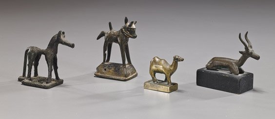 Group of 4 Antique Bronze Animals: Group of 4 Antique Bronze Animals Group of 4 various antique bronze animals, including: possibly Luristan horse; Indian(?) horse; possibly African recumbent deer; and Chinese Bactrian camel-form seal;