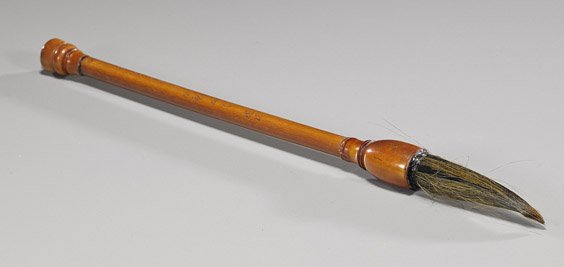 Long Chinese Stained Ivory Brush: Long Chinese Stained Ivory Brush Chinese stained ivory brush; of fine, slender form and with incised calligraphy; L: 12"
