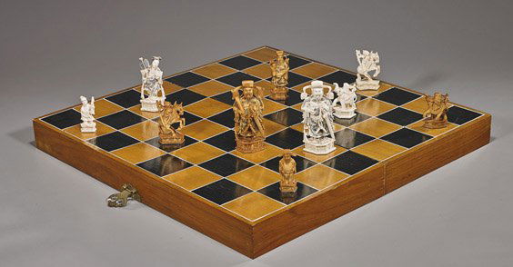 Chinese Carved Ivory Chess Set: Chinese Carved Ivory Chess SetChinese carved ivory chess set of 32 pieces, one half stained and some with inked incised details; figural designs including Immortals; in a fitted board box; H: 3" (tall