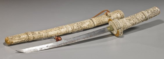 Antique Japanese Bone Samurai Sword: Antique Japanese Bone Samurai Sword Unusual and very elaborately carved, antique Japanese bone Samurai sword; with allover medium and low relief scenes of Samurai warriors, some holding fans (old repa