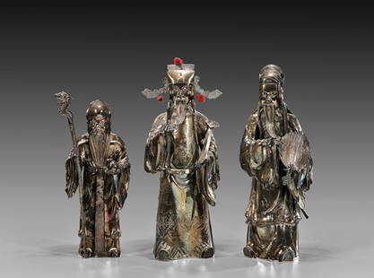 THREE CHINESE EXPORT SILVER FIGURES: 外銷鍍銀福祿壽三星 THREE CHINESE EXPORT SILVER FIGURESSet of old Chinese Export silver figures, depicting the Three Star Gods Fu, Lu and Shou; eac