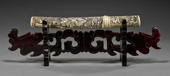 Antique Japanese Carved Bone Dagger: Antique Japanese Carved Bone DaggerVery elaborately carved, antique Japanese bone Samurai dagger (tanto); with allover detailed figural scenes, late 19th Century; L: 13 1/2", modern wood sectional sta