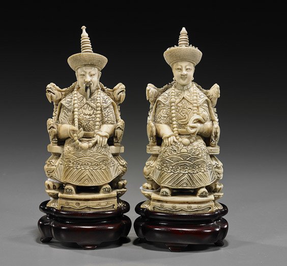 Pair Carved Ivory Emperor & Empress: Pair Carved Ivory Emperor & Empress Pair Chinese carved ivory Emperor and Empress; each seated and wearing a headdress: she in a phoenix throne and holding a scepter; he in a dragon throne and with be