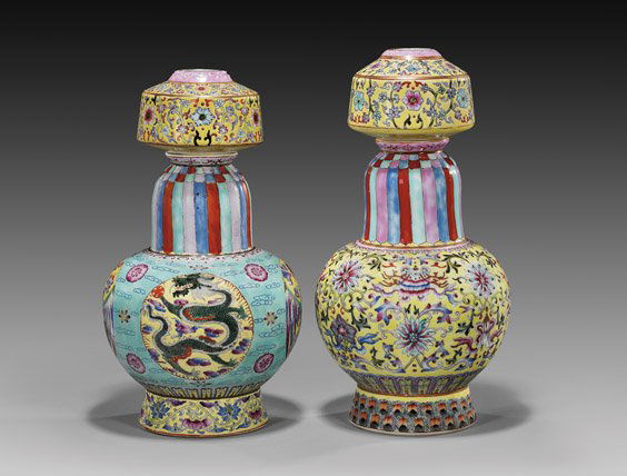 PAIR FAMILLE ROSE SECTIONAL VASES: 民國 粉彩供器 兩件 PAIR FAMILLE ROSE SECTIONAL VASESPair unusual and elaborately Famille Rose enameled, sectional Chinese porcelain vases: the taller wi