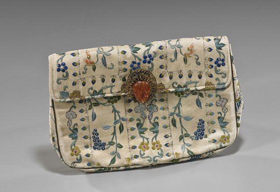 Chinese Embroidered Silk Evening Bag: Chinese Embroidered Silk Evening Bag Early 20th Century, Chinese embroidered silk ladies' evening bag; with allover florals and double gourds, the filigree clasp with carved carnelian agate Buddha's h