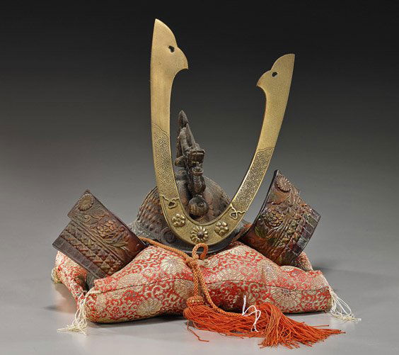 Miniature Samurai Helmet & Tiger Panel: Miniature Samurai Helmet & Tiger PanelDecorative Japanese miniature Samurai helmet with dragon finial, atop a silk pillow; together with a Japanese framed horizontal painted panel of crouching tiger b