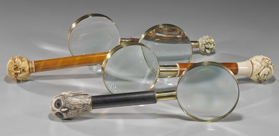 Group of 4 Old Magnifying Glasses: Group of 4 Old Magnifying Glasses Group of 4 various early 20th Century magnifying glasses, each handle mounted with ivory-like composition: 2 in Japanese taste: with zodiac animals at the end, and wi
