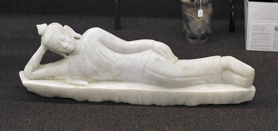 Southeast Asian Carved Marble Reclining Buddha: Southeast Asian Carved Marble Reclining Buddha Southeast Asian (probably Thai) carved marble figure of Buddha; reclining and resting his head on one arm, atop a stylized lotus design base; L: 37"