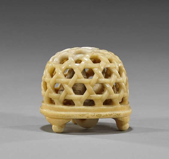 Antique Carved Ivory Netsuke: Rabbits: Antique Carved Ivory Netsuke: Rabbits Unusual antique carved marine ivory netsuke; of an openwork basket/cage with two rabbits on the interior, 19th Century