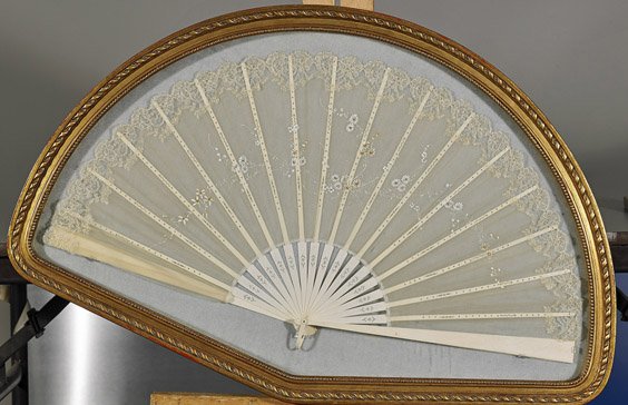 Chinese Silk Fan & Silk Immortals Panel: Chinese Silk Fan & Silk Immortals Panel Early 20th Century, Chinese bone and transparent silk fan painted with flowers and with lace edge, framed in a gilt shadow box; together with silk panel with 8 