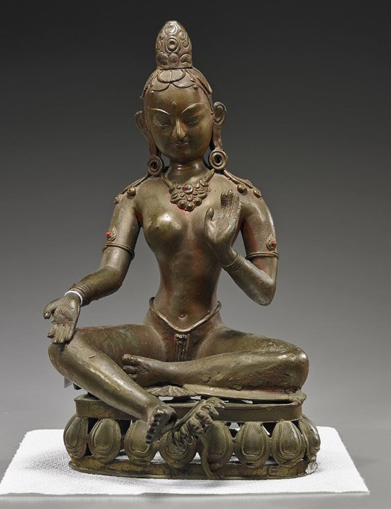 Nepalese Bronze Seated Buddhist Deity: Nepalese Bronze Seated Buddhist Deity Nepalese bronze Buddhist deity; seated on openwork stylized lotus pedestal, partially clothed with "jeweled" jewelry and tall ushnisha-type headdress, and with ha