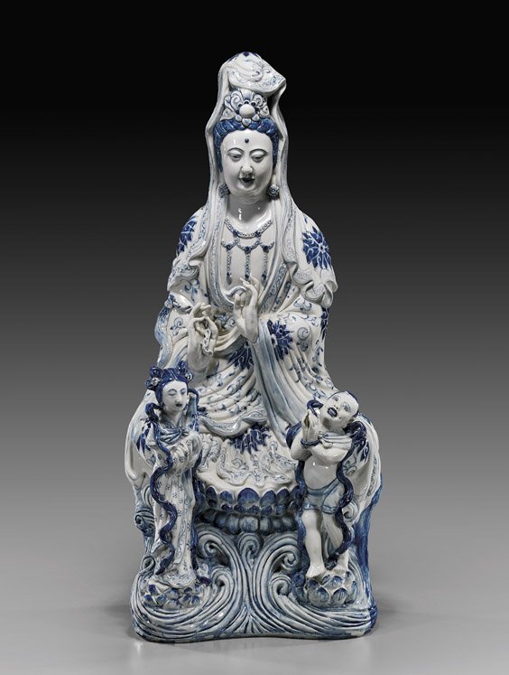 Chinese Blue & White Porcelain Guanyin: Chinese Blue & White Porcelain Guanyin Tall and very heavy, Chinese blue and white porcelain Guanyin; seated atop a lotus pedestal above waves and wearing long robes and veil with Buddhist floral moti
