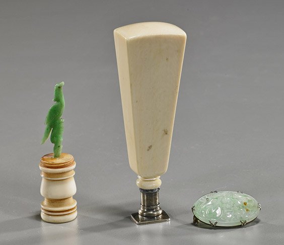 Three Various Chinese Items: Three Various Chinese Items Three Chinese items: old carved jadeite bird on turned ivory finial; ivory mounted continental monogram seal, Circa 1900; and an old silver mounted and openwork carved oval