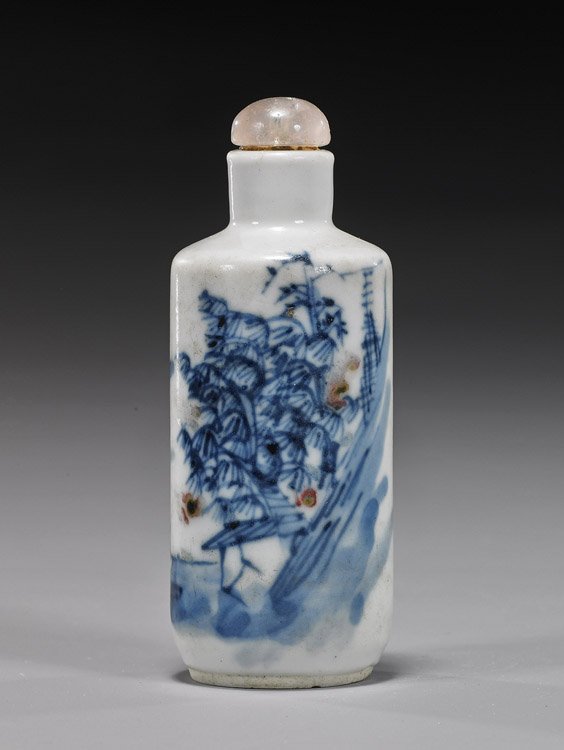 Antique Underglaze Porcelain Snuff Bottle: Antique Underglaze Porcelain Snuff Bottle Antique Chinese blue and white, with copper red, underglaze porcelain snuff bottle; cylindrical form with landscape scene (minor wear), rock crystal stopper; 