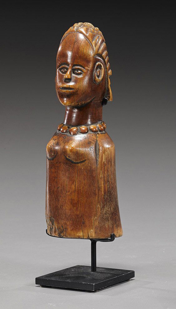 Old African Carved Ivory Female Bust: Old African Carved Ivory Female BustOld African carved ivory bust; of a female wearing a necklace and with incised patterned hair, heavily patinated (wear, small chips)l H: 7 1/2", metal stand