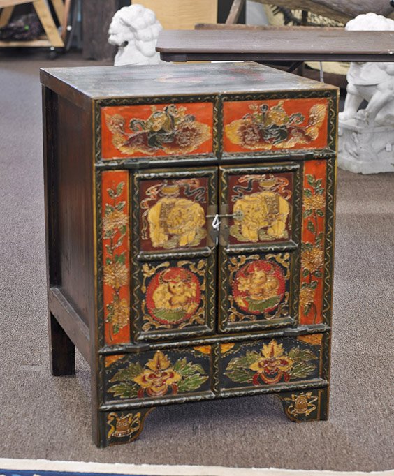 Tibetan or Mongolian Lacquered Cabinet: Tibetan or Mongolian Lacquered Cabinet Colorful Tibetan or Mongolian lacquered storage cabinet; with double doors, peacock to the top and various animal motifs to the front (minor flaws); H: 33"