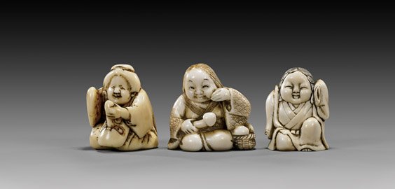 THREE CARVED IVORY SHUNGA NETSUKE: 象牙根付 三件 THREE CARVED IVORY SHUNGA NETSUKE Three early 20th Century, carved ivory shunga netsuke, each of a seated Okame: the larger holding phallic mushrooms,