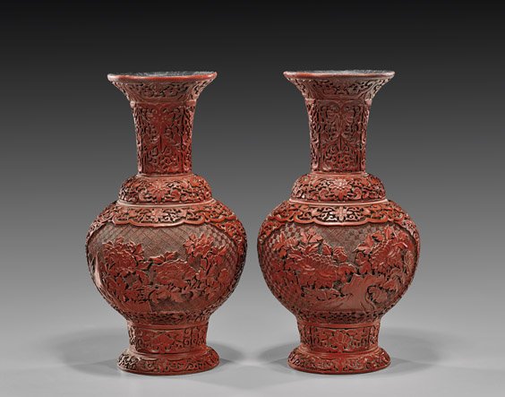 PAIR QIANLONG-STYLE CINNABAR LACQUER VASES: 剔紅牡丹紋瓶 一對 PAIR TALL CINNABAR LACQUER VASES Pair of tall and finely carved, Chinese Qianlong-style cinnabar lacquer vases; each of baluster form,