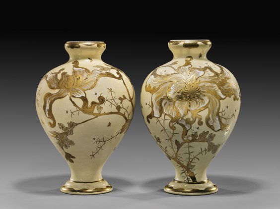 PAIR JAPANESE EARTHENWARE VASES: 日式花卉紋瓶 一對 PAIR JAPANESE EARTHENWARE VASESPair of Japanese Satsuma or Kyoto-ware, gilt decorated earthenware footed vases; of bulbous baluster fo